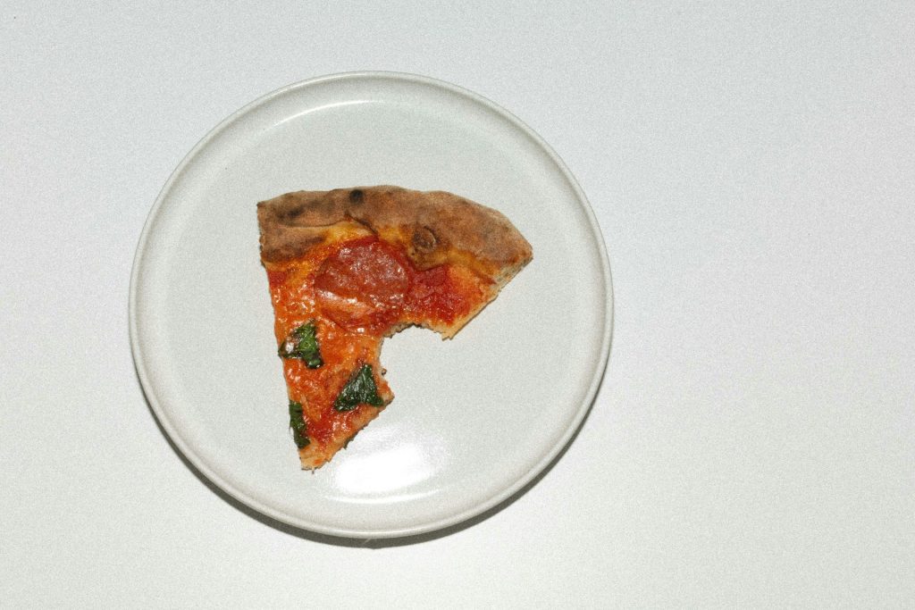 single slice of pizza representing a share which could be ordinary or preference